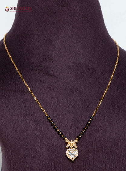Anvika Heart American Diamond Mangalsutra Necklace with Halo CZ Heart Pendant and Black Beads in Gold Plated Finish