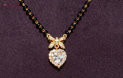 Anvika Heart American Diamond Mangalsutra Necklace with Halo CZ Heart Pendant and Black Beads in Gold Plated Finish