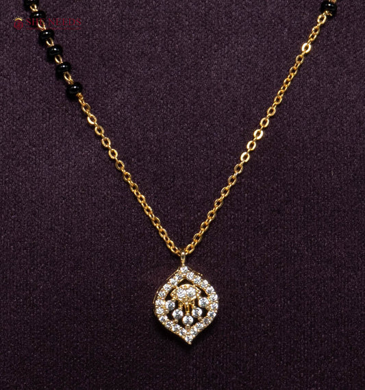 Ishira Divine American Diamond Mangalsutra Necklace with CZ Devotional Pendant and Black Beads in Gold Plated Finish