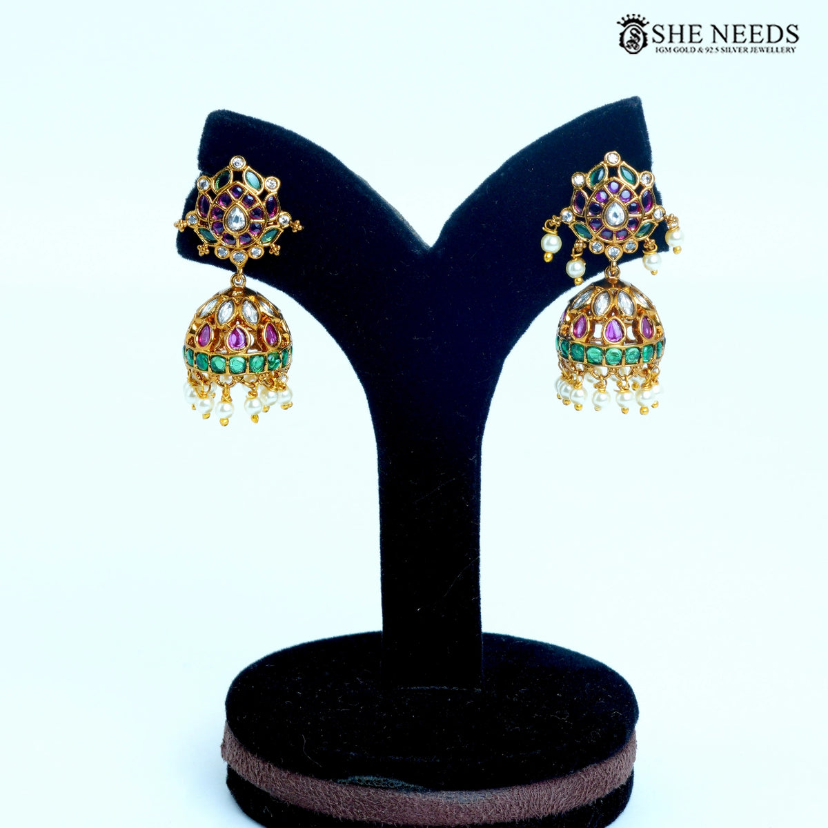 Kavisha pair of floral dome jhumka earrings featuring green, pink and white stones with pearl drops|She Needs Jewellery