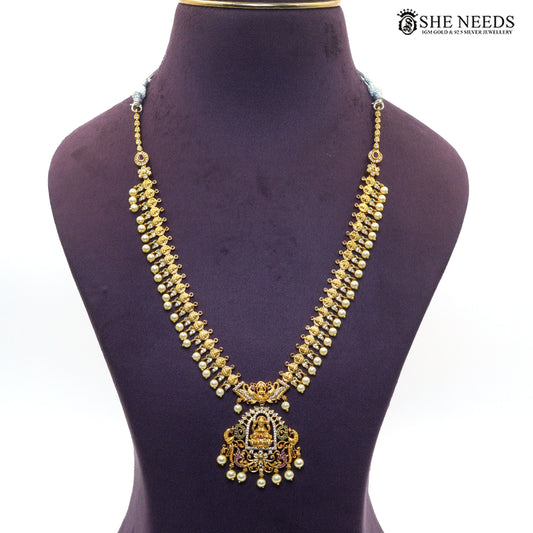 Double layer antique gold Lakshmi necklace with intricate motifs and pearl drops|She Needs Jewellery

