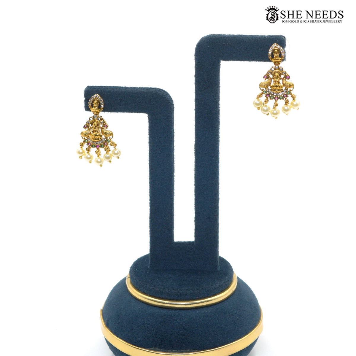 Lakshmi Pearl Cascade antique gold earrings with Goddess Lakshmi motif, ruby and green stones and pearl drops|She Needs Jewellery