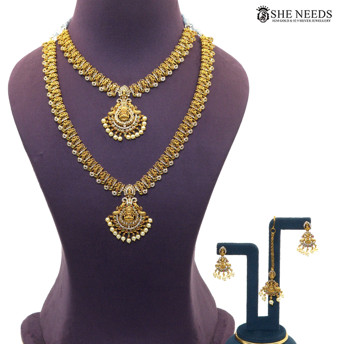 Lakshmi Pearl Cascade antique gold layered necklace set with short and long necklaces, matching earrings and maang tikka|She Needs Jewellery
