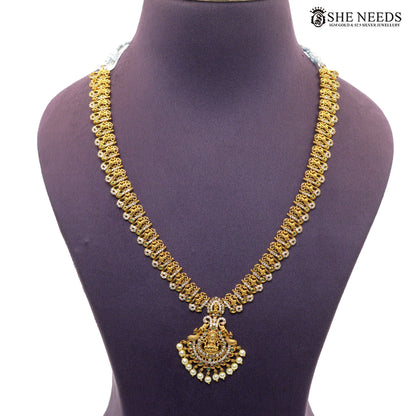 Lakshmi Pearl Cascade antique gold long necklace with Goddess Lakshmi pendant, intricate detailing and pearl drops|She Needs Jewellery