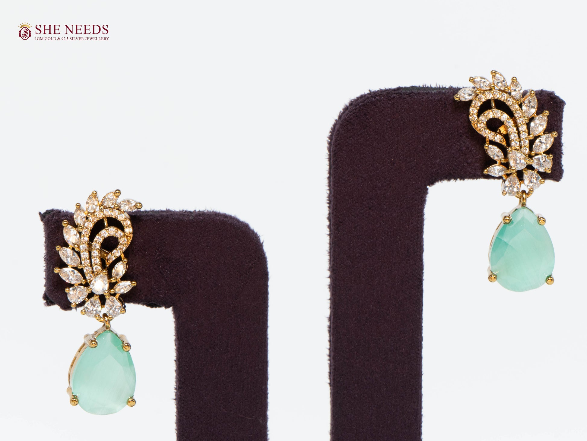 Light Blue Crystal Drop Earrings with Sparkling American Diamonds in Gold Plated Finish for Party, Wedding, and Festive Wear