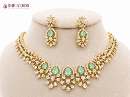 Light Blue Gold Plated American Diamond Floral Necklace Set with Matching Statement Drop Earrings by She Needs Jewellery