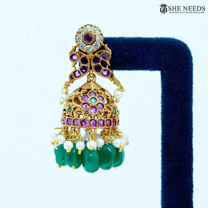 Mayura Antique Gold Peacock Temple Jhumka Earring with Green Beads, American Diamonds, Ruby Stones and Pearl Drops|She Needs Jewellery
