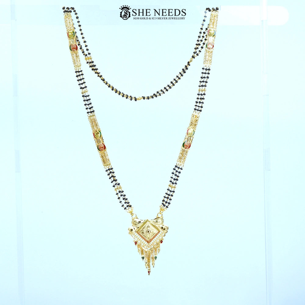 Full view of Mayuri Gold Plated Traditional Mangalsutra with a diamond-shaped engraved pendant, decorative tassels, side embellishments, and a classic black bead chain.|She Needs Jewellery
