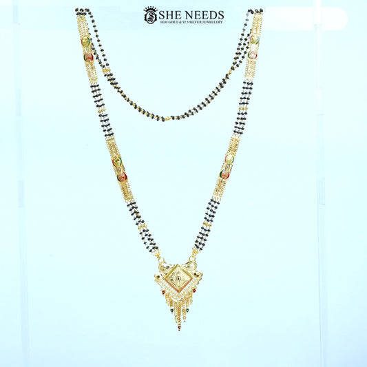 Full view of Mayuri Gold Plated Traditional Mangalsutra with a diamond-shaped engraved pendant, decorative tassels, side embellishments, and a classic black bead chain.|She Needs Jewellery
