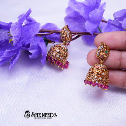 Antique gold jhumka earrings with CZ stones and Pink Beads drops traditional jewellery by She Needs Jewellery