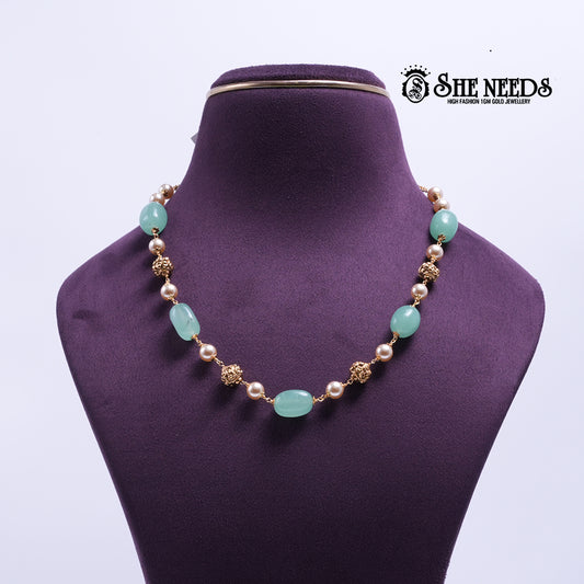 Mint Pearl Elegance Necklace featuring mint green oval stones, pearl beads, decorative gold spacer beads, and a premium gold finish | She Needs Jewellery