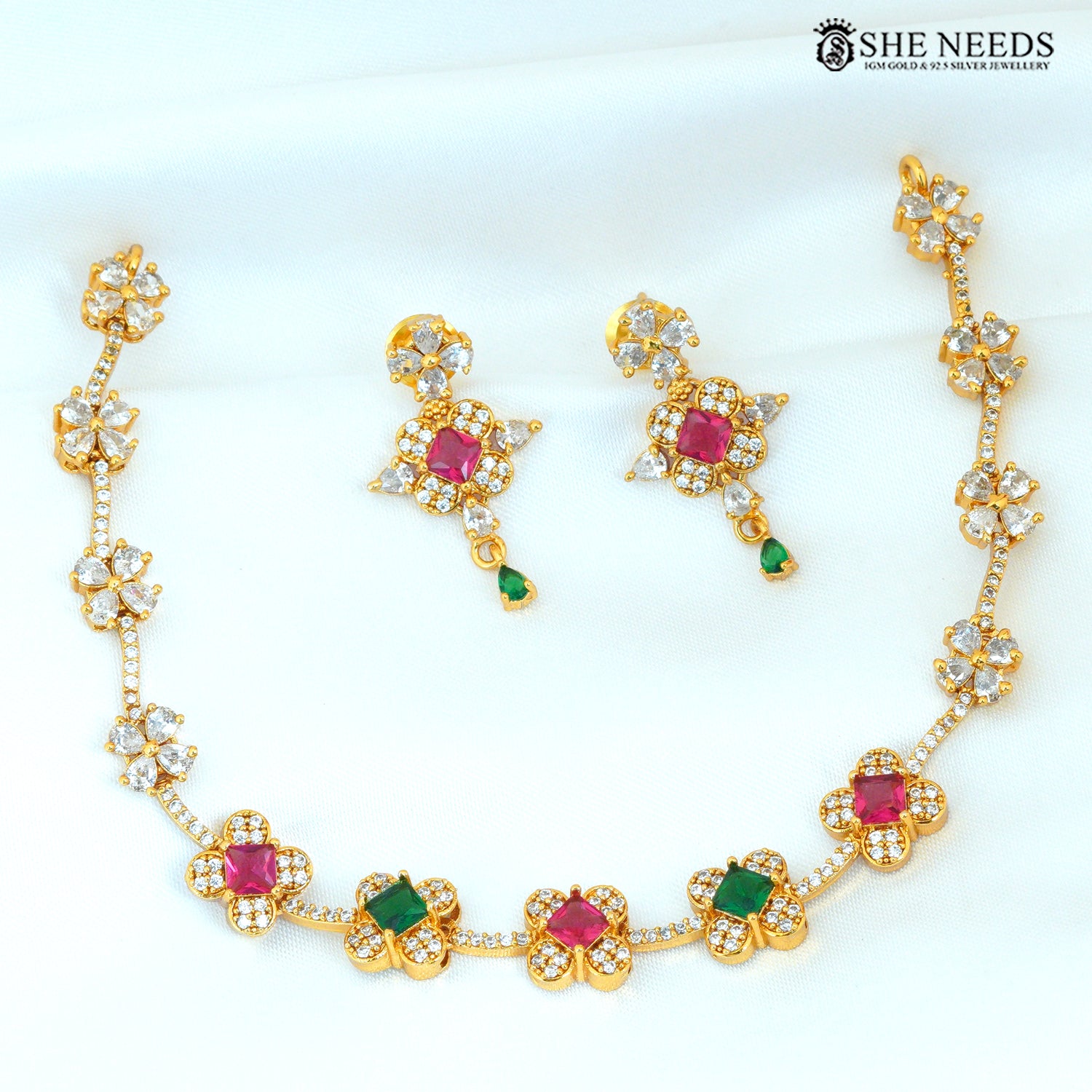 Multicolor floral gold-plated necklace set with ruby, green and white stones and matching earrings|She Needs Jewellery
