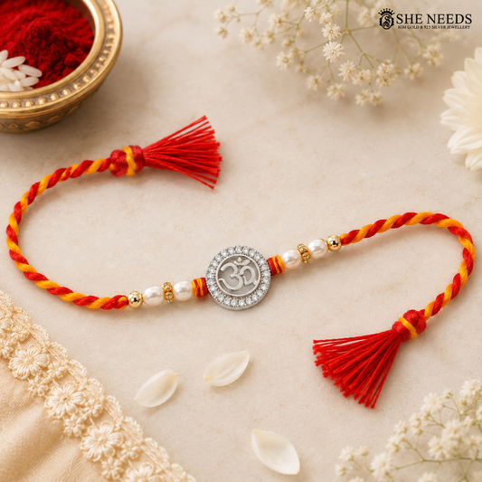 Om Radiance 925 silver Rakhi with pearl beads, sparkling stones and red-yellow braided thread