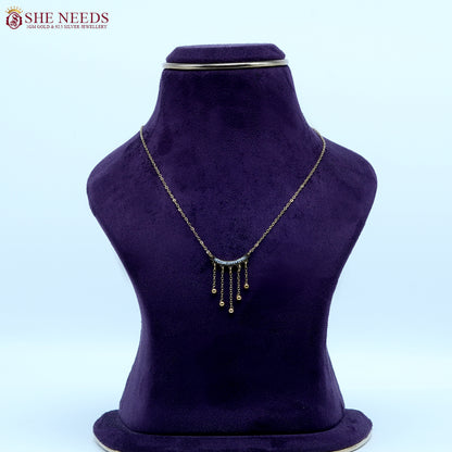 Crystal drop curve gold necklace by She Needs Jewellery