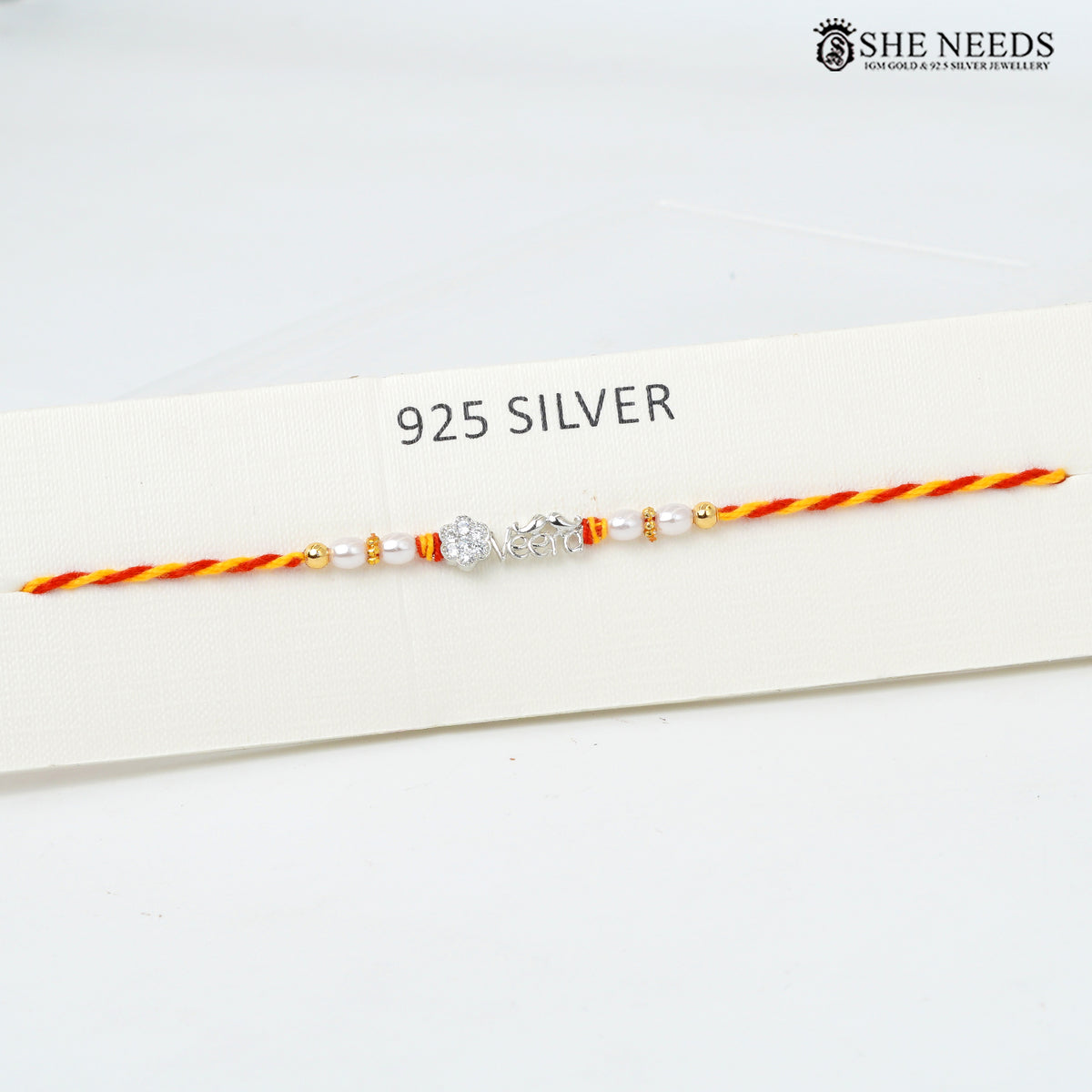 VEERA 925 Silver Rakhi with Pearl & Floral CZ Motif