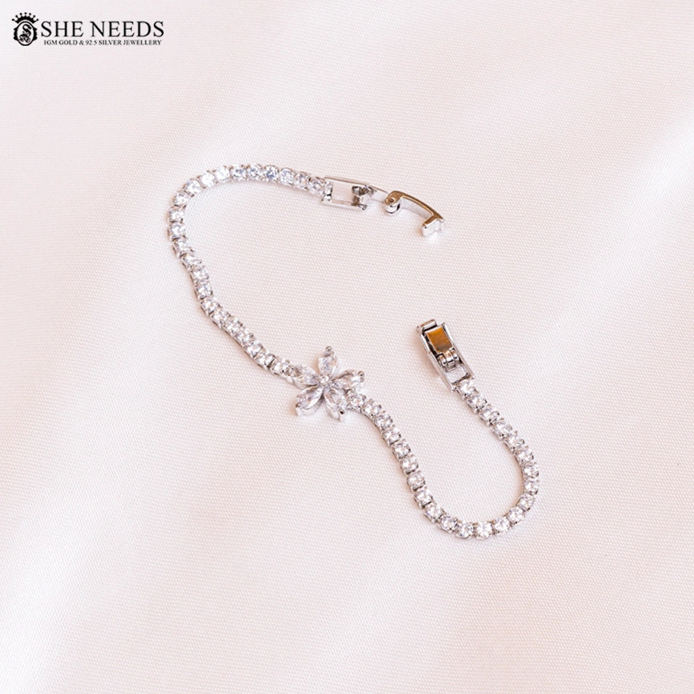 Silver Finish CZ Tennis Bracelet with Floral Center Design
