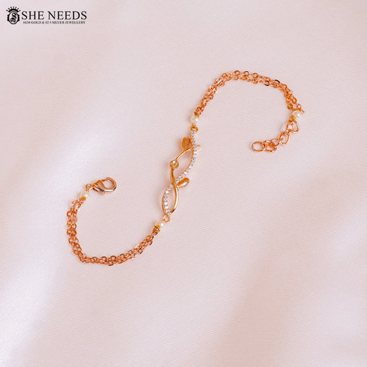 Rose gold pearl chain bracelet with CZ infinity design by She Needs Jewellery
