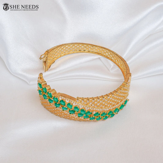 Heavy look gold cuff bracelet with green stones for women | She Needs Jewellery