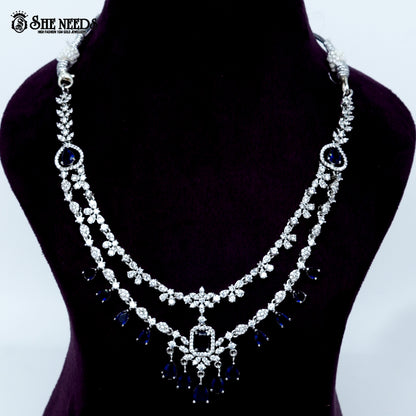 Ethereal layered blossom rhodium silver necklace with floral design and center pendant