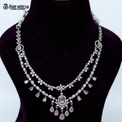 Ethereal layered blossom rhodium silver necklace with floral design and center pendant