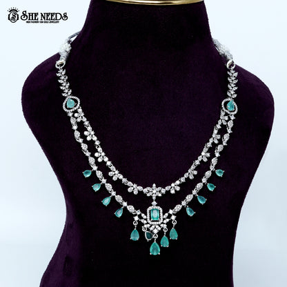 Ethereal layered blossom rhodium silver necklace with floral design and center pendant