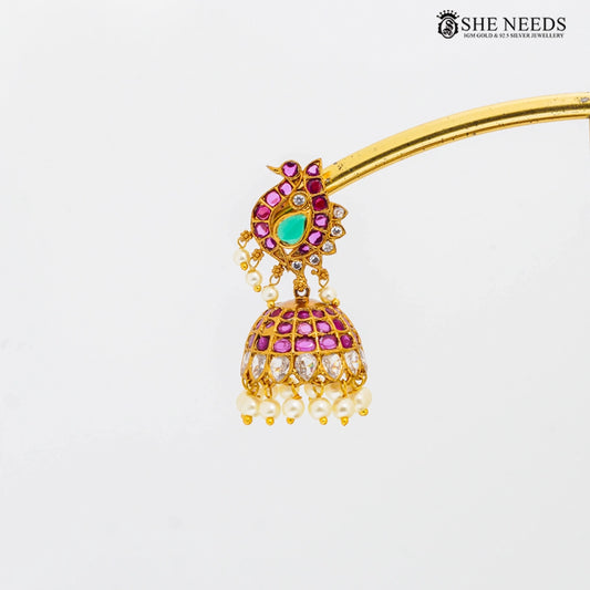 Peacock design gold temple jhumkas with pink stones and pearl drops by She Needs Jewellery