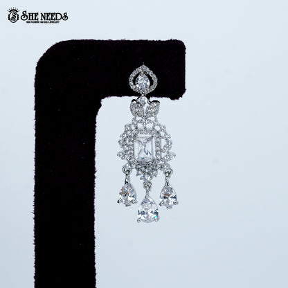Ethereal layered blossom rhodium silver necklace with floral design and center pendant