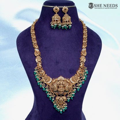 Long nakshi Lakshmi temple necklace set with green bead drops and matching jhumkas by She Needs Jewellery