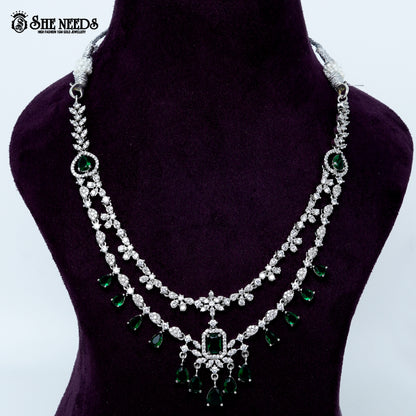 Ethereal layered blossom rhodium silver necklace with floral design and center pendant