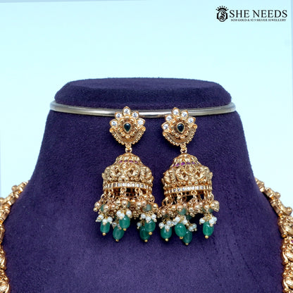 Long nakshi Lakshmi temple necklace set with green bead drops and matching jhumkas by She Needs Jewellery