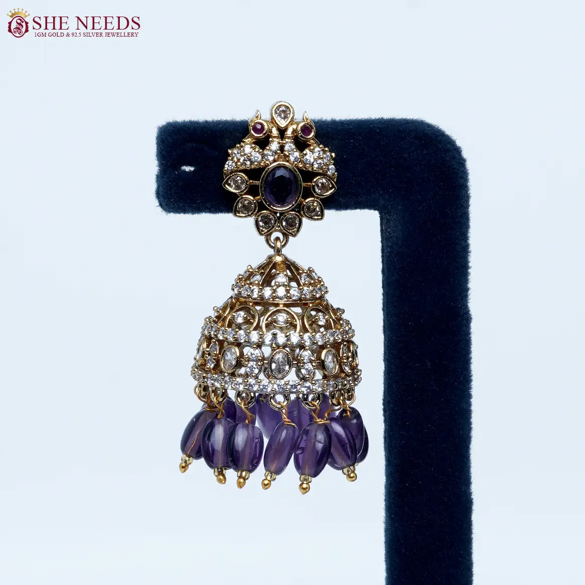 Royal purple crystal antique jhumka earrings by She Needs Jewellery