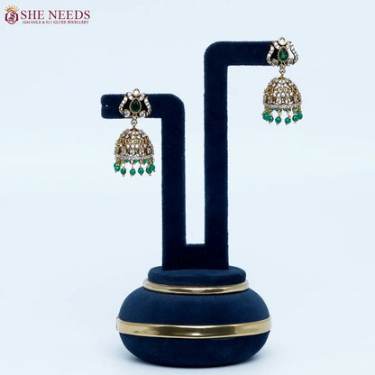 Emerald Green crystal antique jhumka earrings by She Needs Jewellery