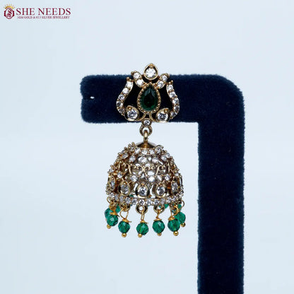 Emerald Green crystal antique jhumka earrings by She Needs Jewellery