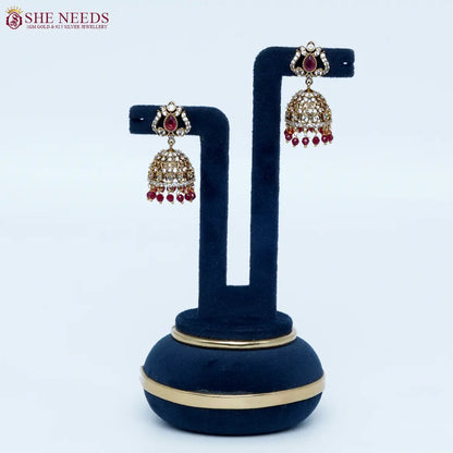 Emerald Red crystal antique jhumka earrings by She Needs Jewellery