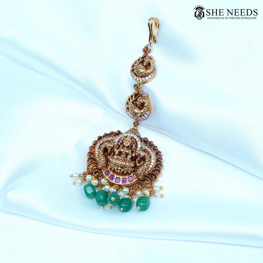 Lakshmi nakshi maang tikka with green bead drops and pearl hangings by She Needs Jewellery