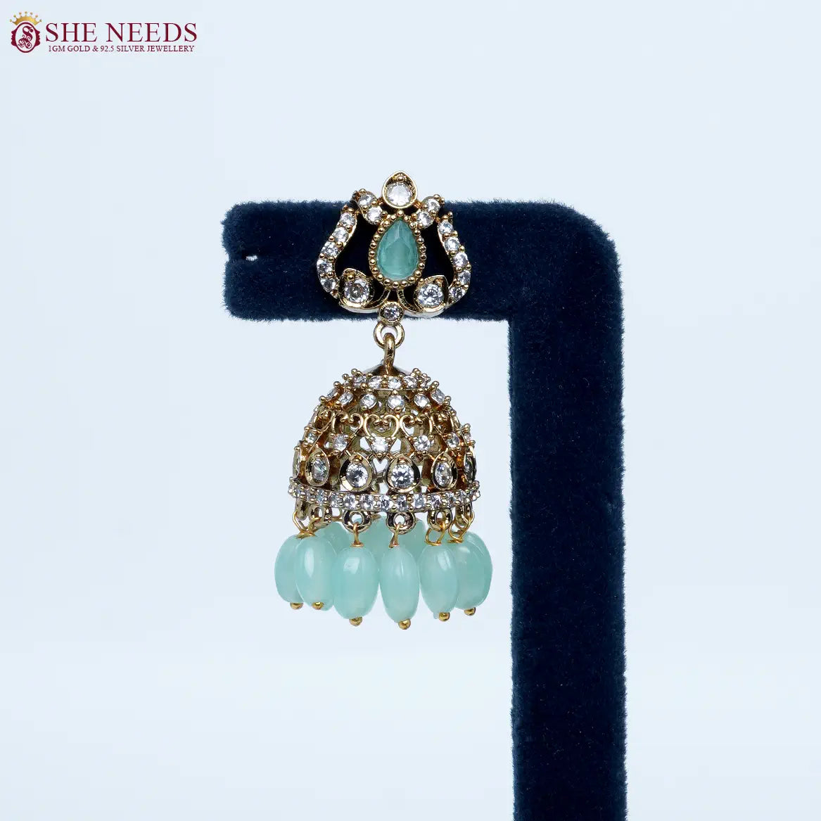 Emerald Light green crystal antique jhumka earrings by She Needs Jewellery