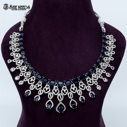 Majestic loop crest rhodium silver statement necklace with cascading drop design