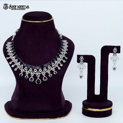 Majestic loop crest rhodium silver statement necklace with cascading drop design