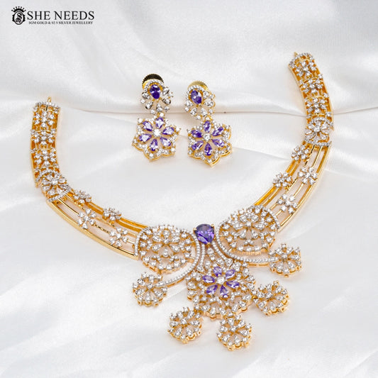 Floral CZ diamond necklace set with green stone accents and matching earrings by She Needs Jewellery