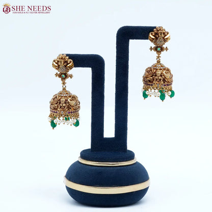 Lakshmi pearl temple jhumka earrings with green beads by She Needs Jewellery