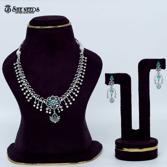 Celestial blossom vine rhodium silver necklace with floral center and cascading design