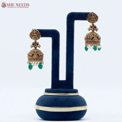 Antique Lakshmi temple jhumka earrings with green bead drops by She Needs Jewellery