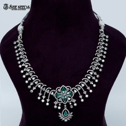 Celestial blossom vine rhodium silver necklace with floral center and cascading design