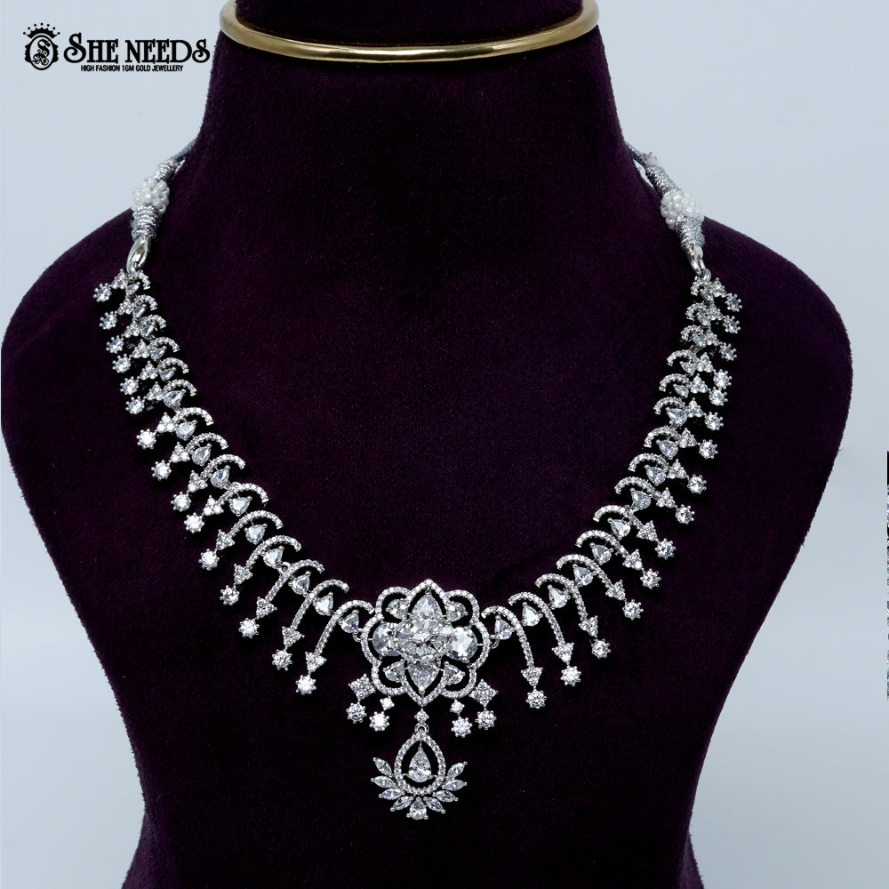 Celestial blossom vine rhodium silver necklace with floral center and cascading design