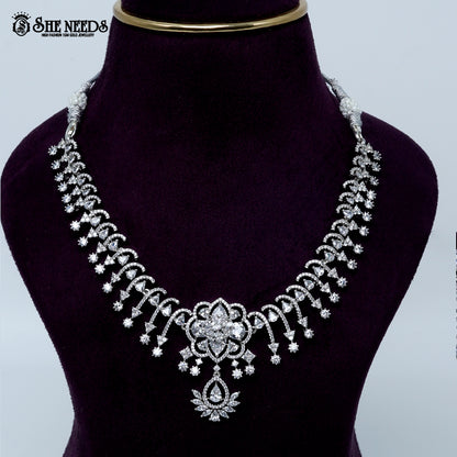 Celestial blossom vine rhodium silver necklace with floral center and cascading design