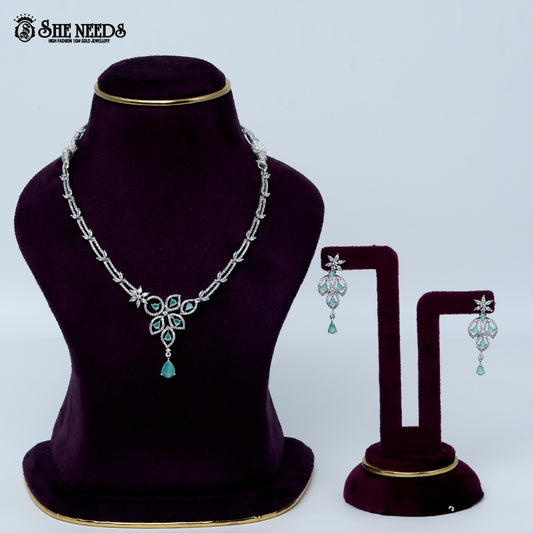 Graceful petal drop rhodium silver necklace with elegant floral pendant design