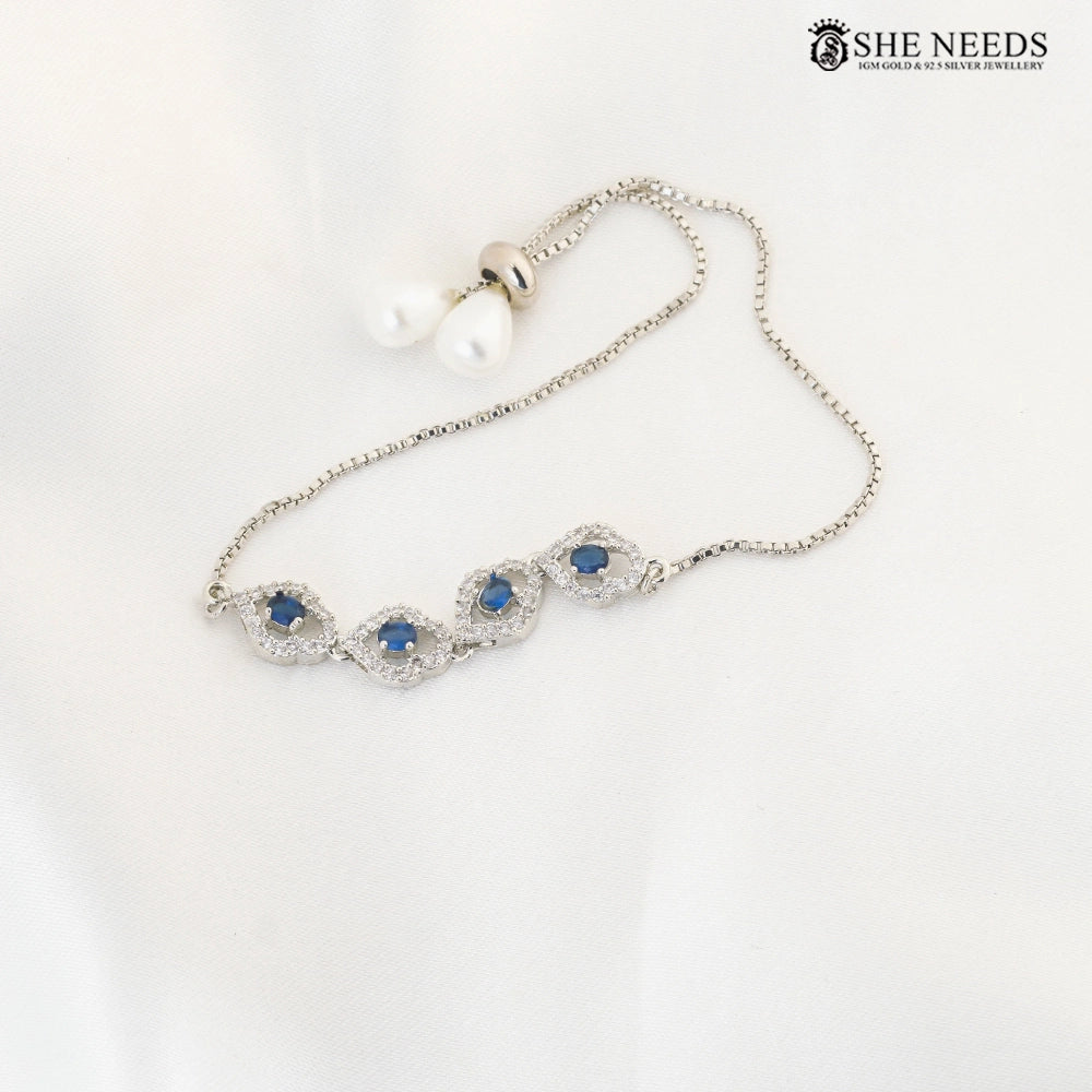 Blue CZ Adjustable Bracelet with Halo Design