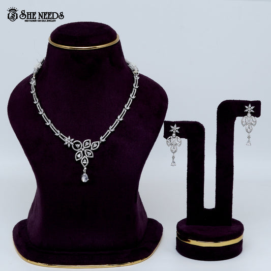 Graceful petal drop rhodium silver necklace with elegant floral pendant design