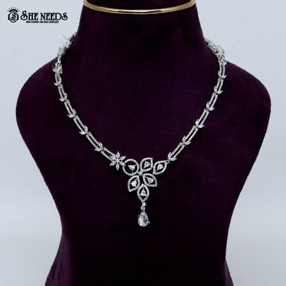 Graceful petal drop rhodium silver necklace with elegant floral pendant design