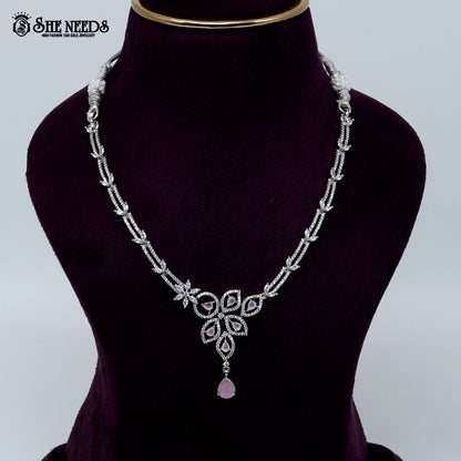 Graceful petal drop rhodium silver necklace with elegant floral pendant design